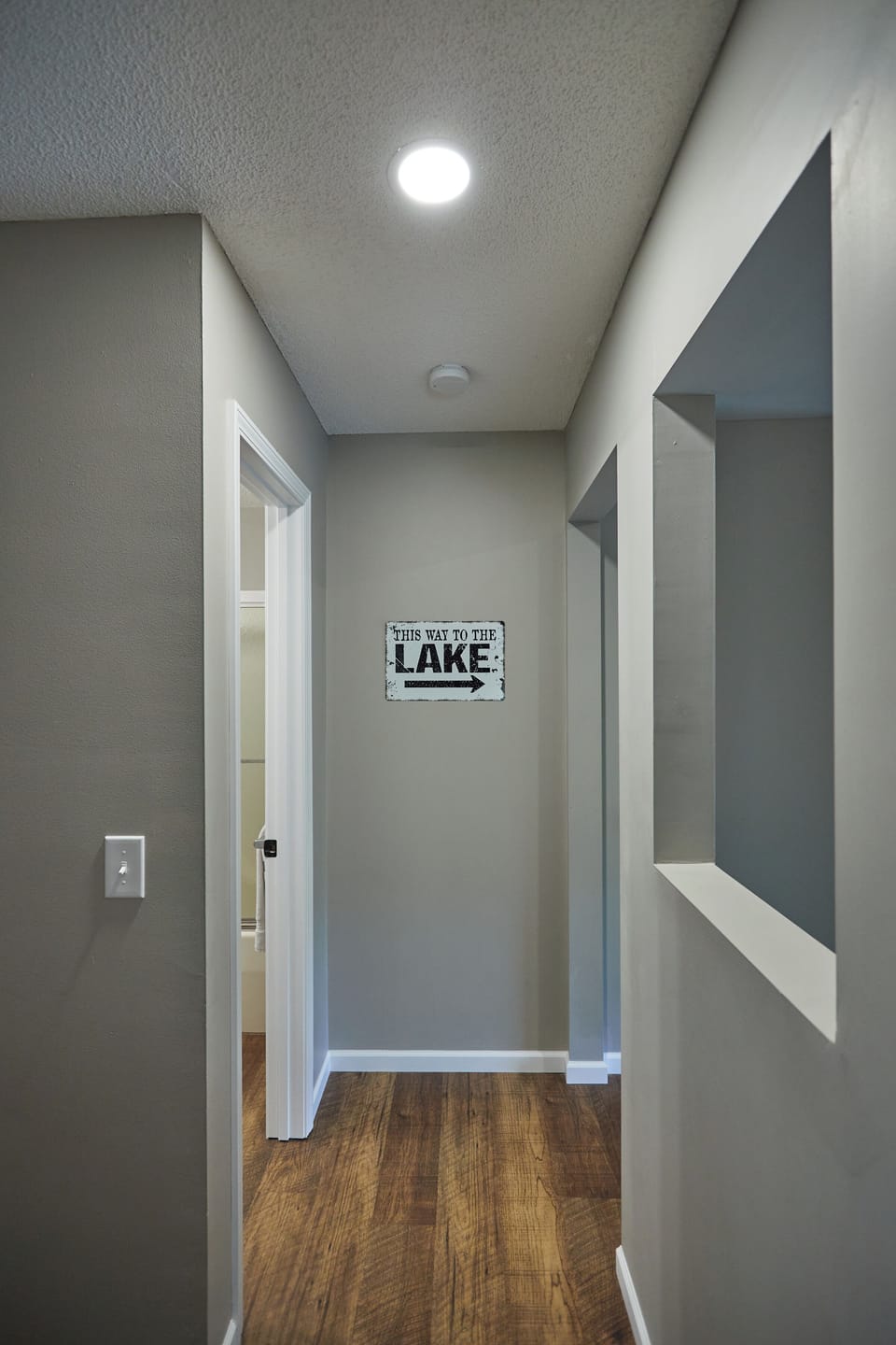 End of upstairs hallway; stairs to lower level