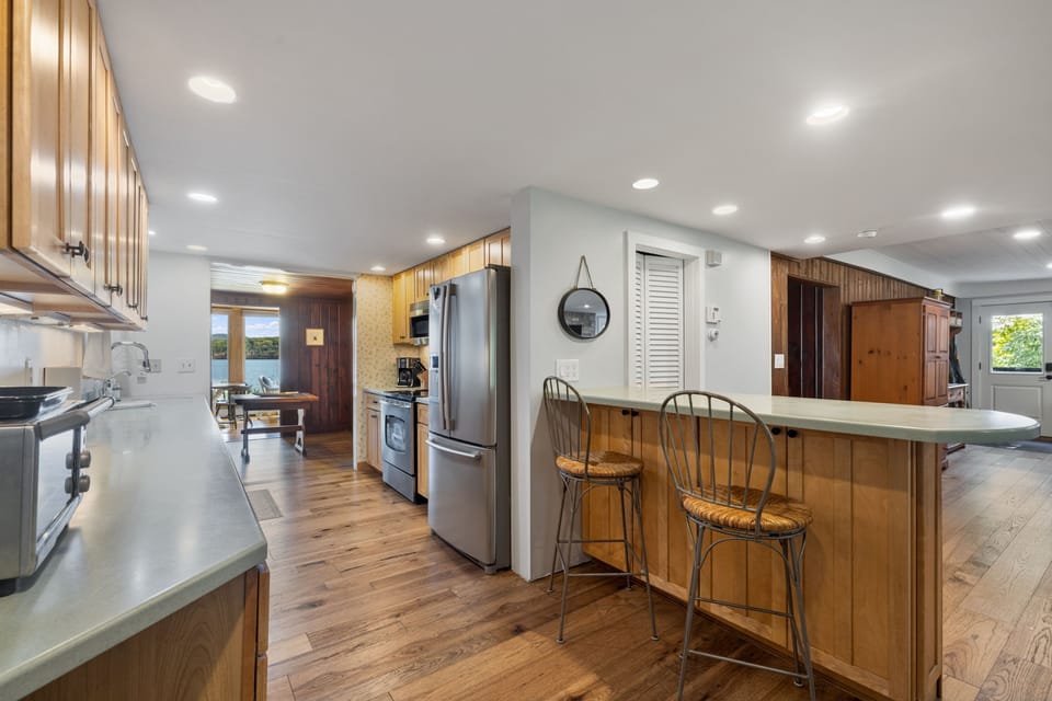 The Living room opens into the Kitchen