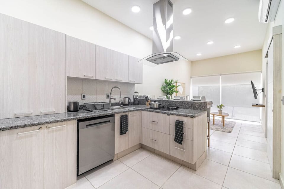 Cook up a feast in this fully equipped kitchen, complete with modern appliances and ample counter space