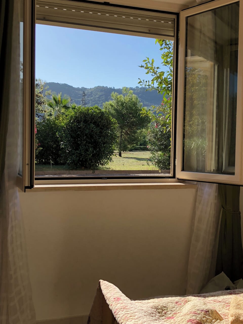 View of gardens and hills from master bedroom