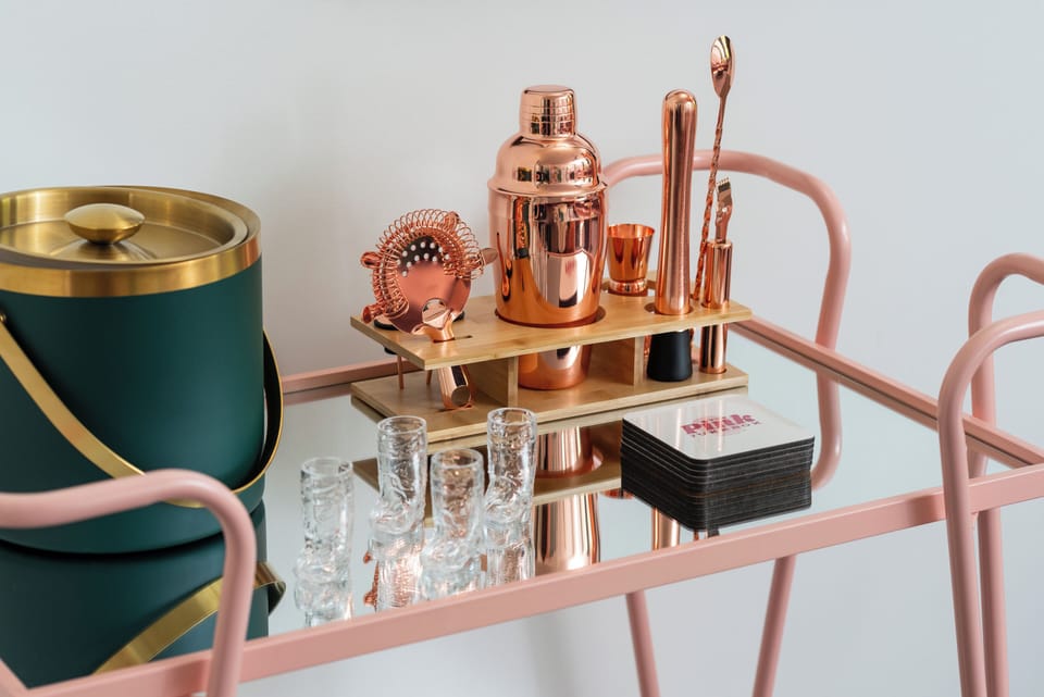 Bar cart and supplies for the mixologist in the group