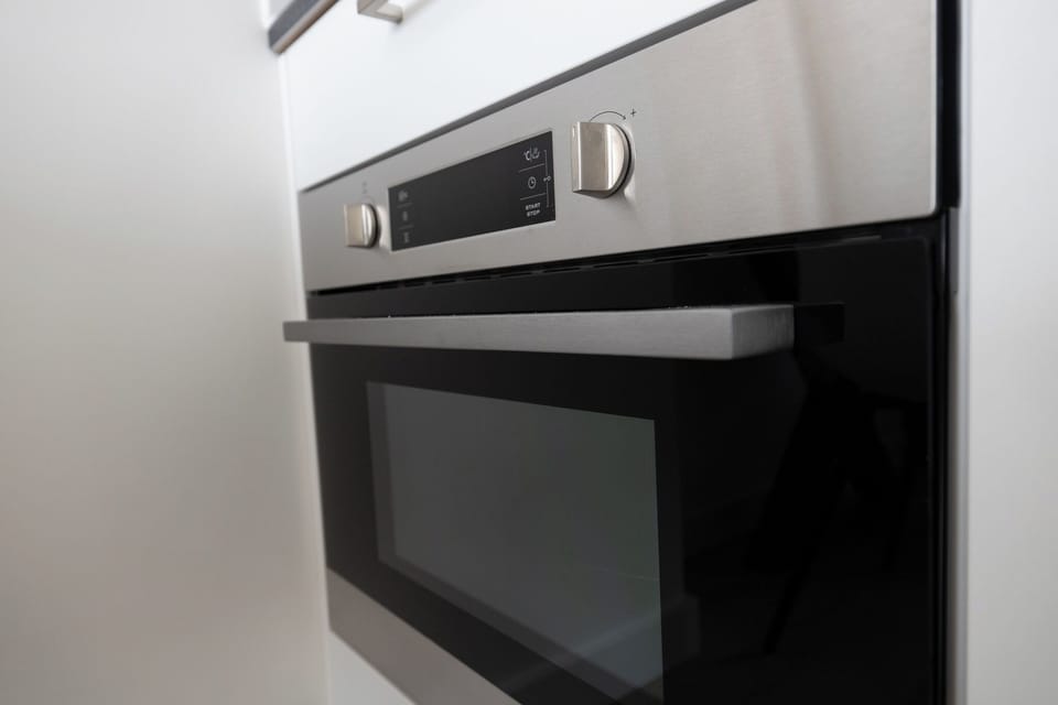 This kitchen features all the essentials, from stainless steel appliances to cookware and utensils, ensuring you have everything you need to cook and enjoy your meals.