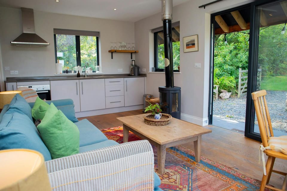 Cabin with open plan kitchen, dining and sitting area