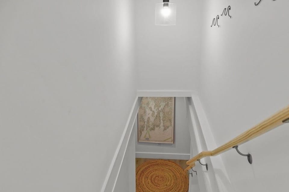 Stairway to lower level Game Room and Laundry/Full Bath