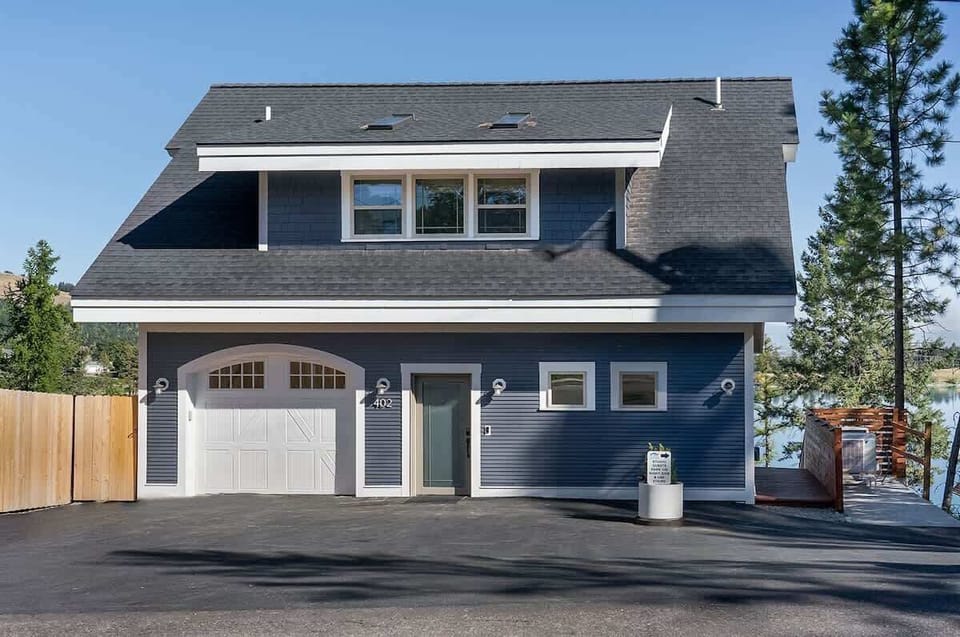 Beautiful home exterior located next to the lake