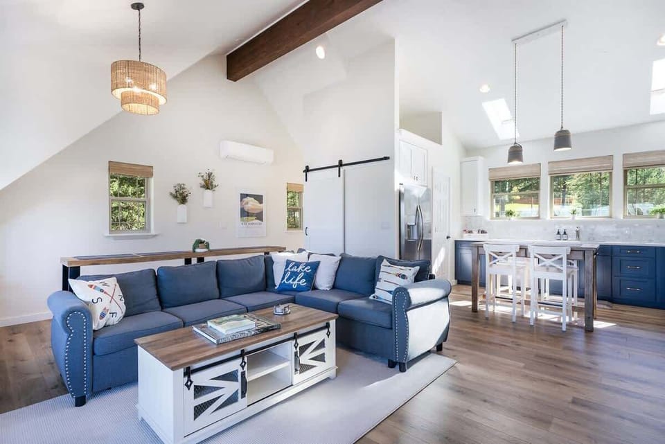 Living area and full kitchen with dining area