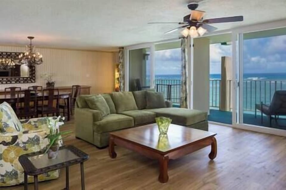 Large great room with amazing ocean views that include dinning, living and kitchen areas. (1)