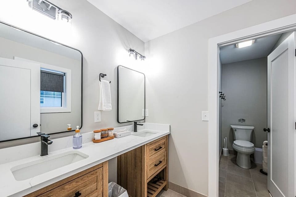 Two sinks w/separate shower and toilet.
