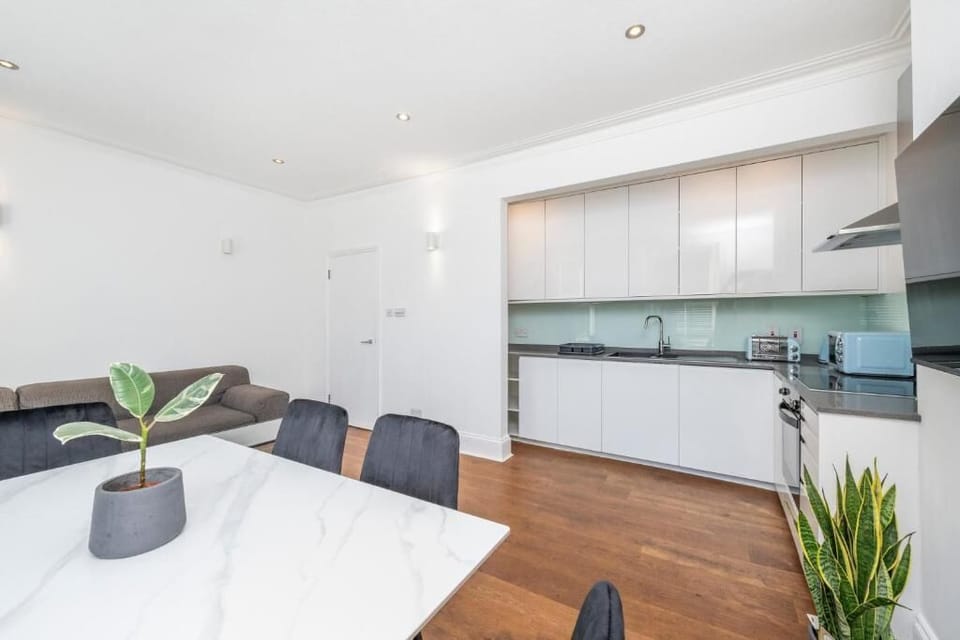 Contemporary open living and dining space with a welcoming atmosphere.