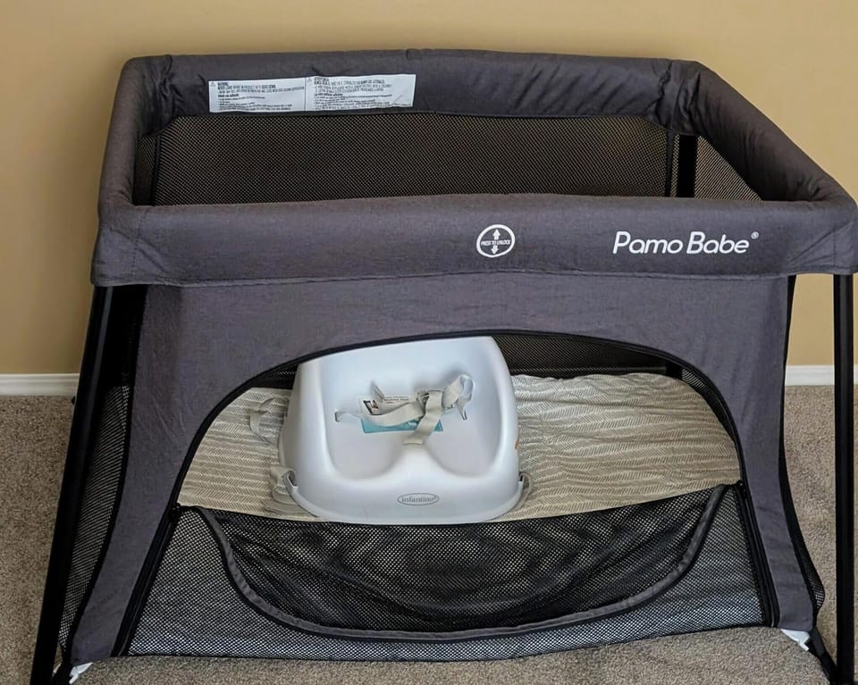 4th bedroom Playpen and high seat