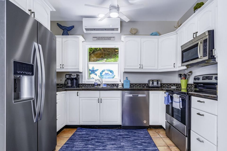 Spacious, well-appointed kitchen with AC.