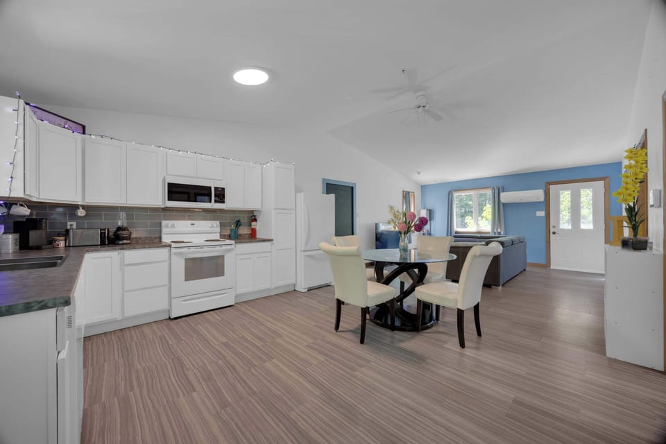 The unit as you enter from outside into the unit, kitchen, dining to living room.