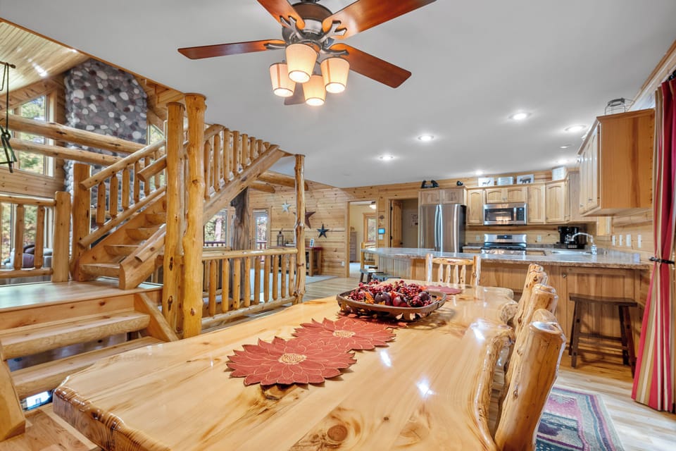 Dining are overlooking kitchen and stairway to the loft area