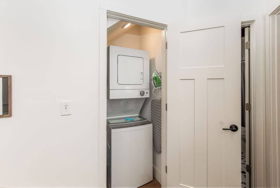 Load a wash in between pool days — the washer and dryer, plus iron and board