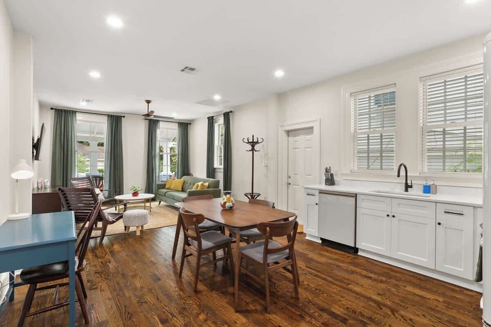 Spacious open layout with full kitchen, dining table, and cozy living area—great for gathering and unwinding after a day out.