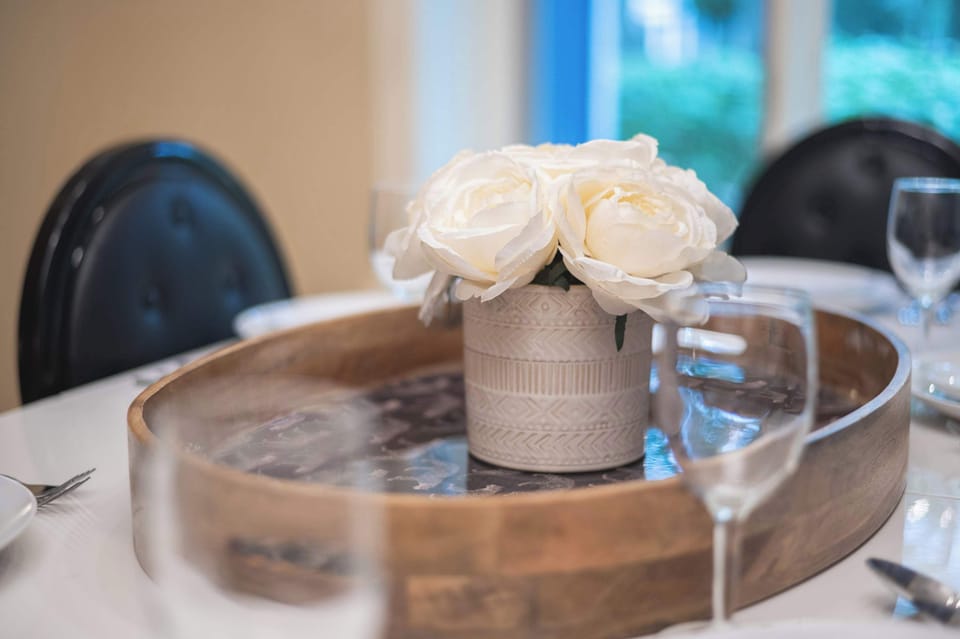 Elegant meals can be enjoyed at the dining table, offering seating for 6