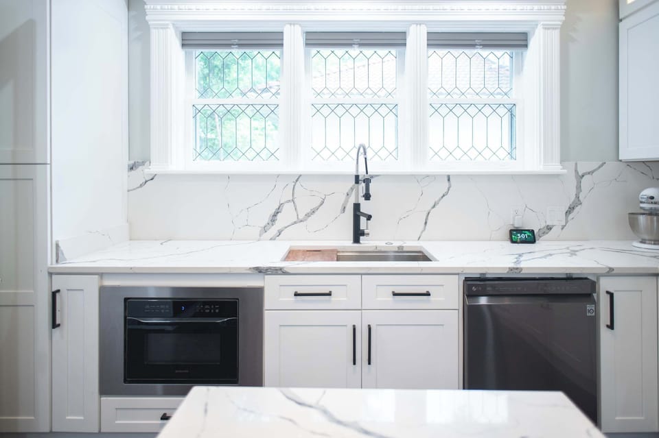 The stunning gourmet kitchen offers ample space & all the comforts of home