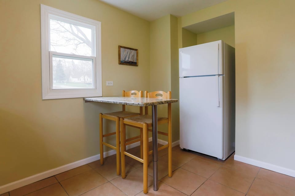 Enjoy morning coffee and meals in the kitchen, offering table seating for 2