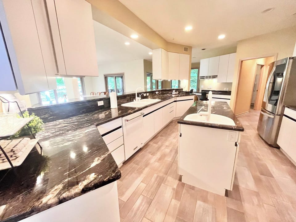 The grand kitchen offers loads of space & all the comforts of home