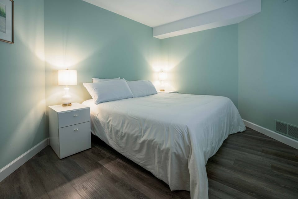 Sink into serenity in the basement bedroom with a king bed