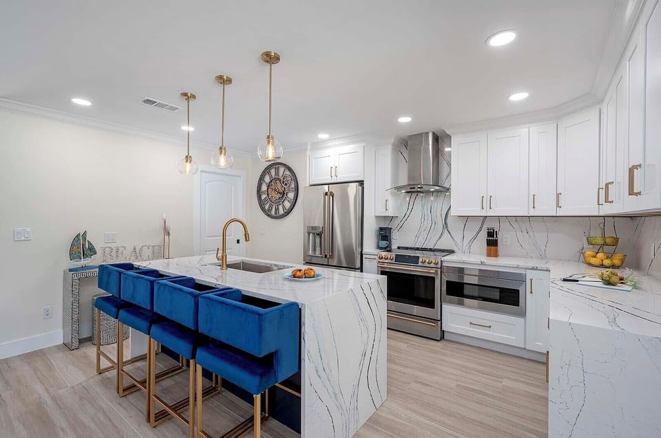 Great Open Kitchen with Center Island, Bar Seating and Stainless Appliances