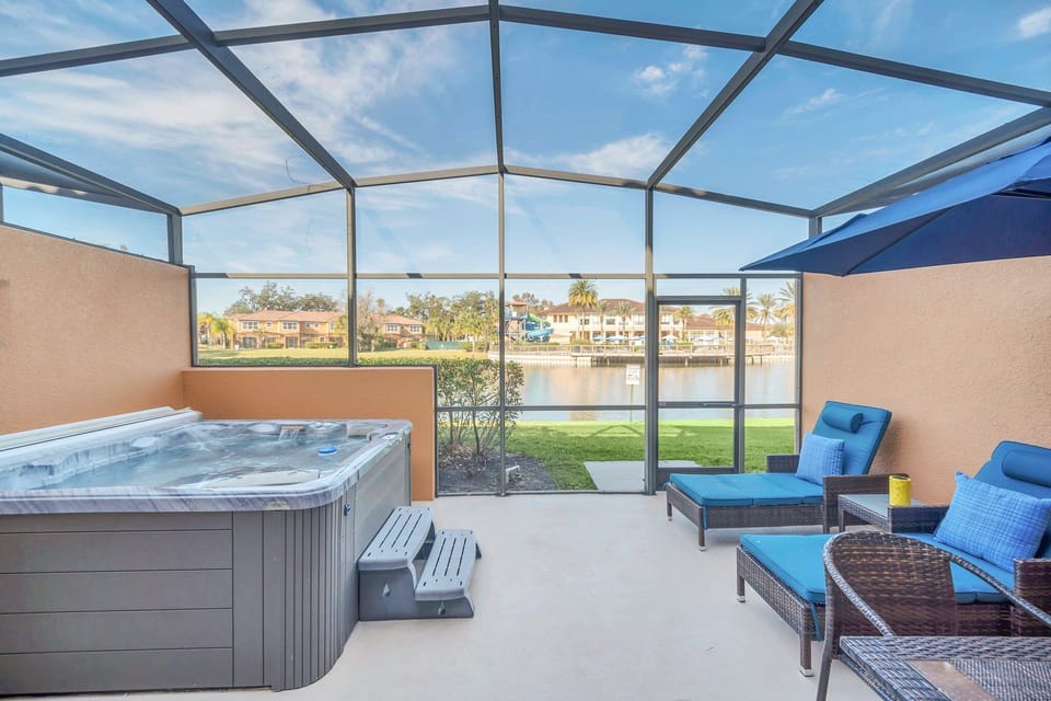 Hot tub and loungers on the private covered lanai