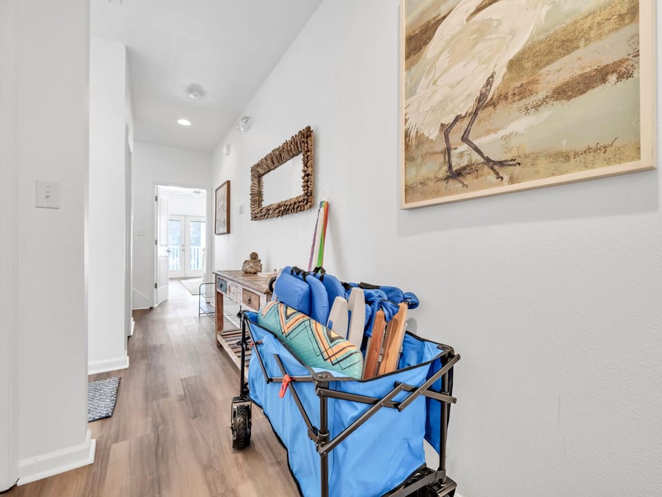 The house is stocked with everything you need for a day at the beach: Cool Cabana, wagon, beach chairs, boogie and skim boards, and a beverage cooler