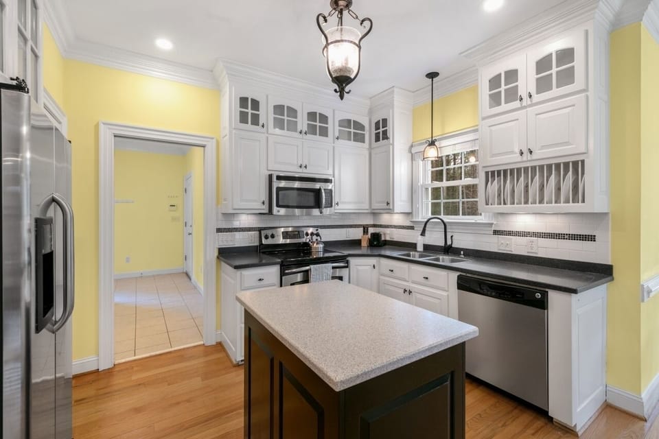 Well-equipped kitchen with modern appliances and ample storage.