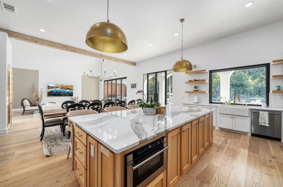 Massive kitchen and island for all your family to gather. 