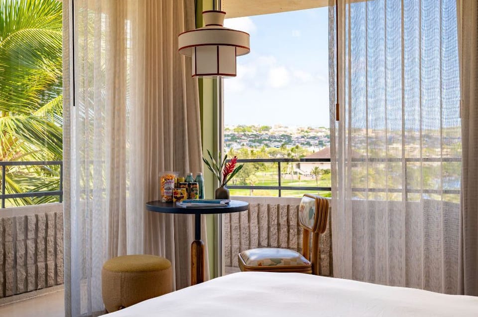 Step into a tranquil retreat where natural light flows through, offering a peaceful atmosphere with scenic views just outside.