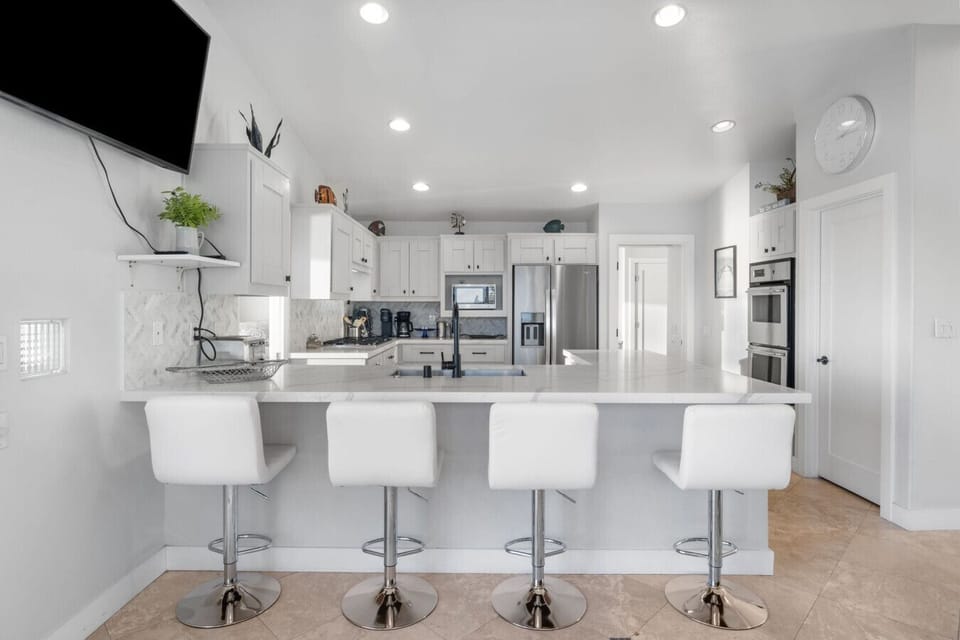 Kitchen with bar stools