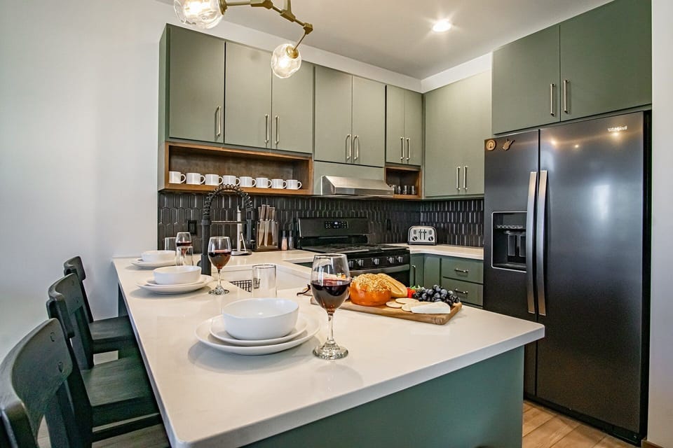 Fully stocked and beautifully decorated kitchen on the first floor with a gas range!