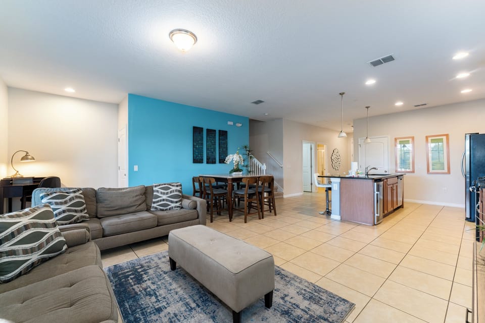 Open floor plan showing kitchen, dining and living rooms