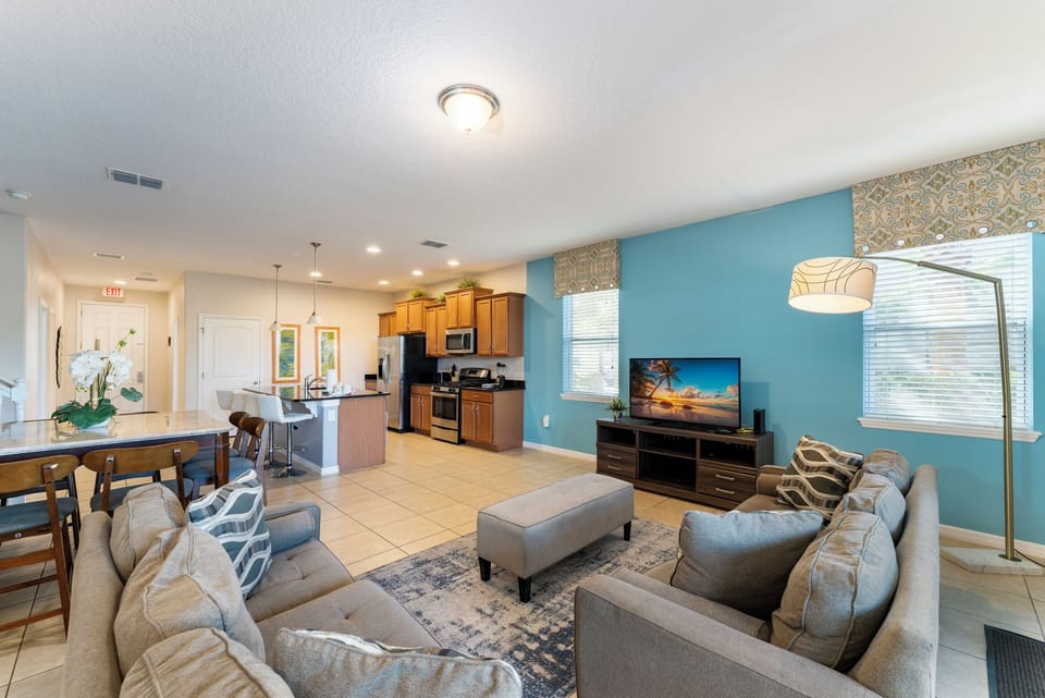 Living room showing TV and seating areas