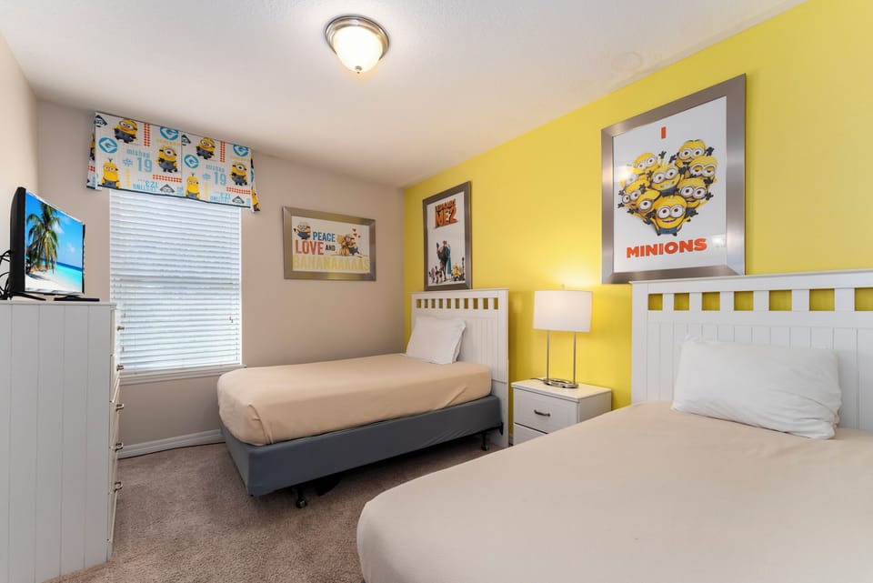 Bedroom 5 Upstairs Minion Themed Kid's Room has 2 twin beds and TV