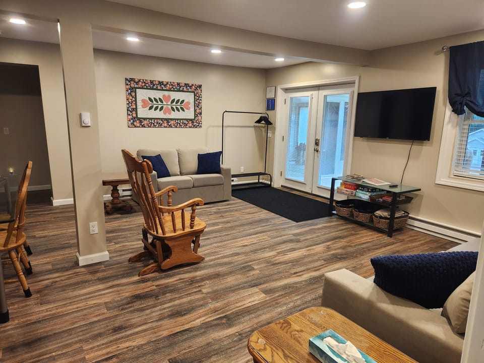 Open great room with wide paths for accessibility.