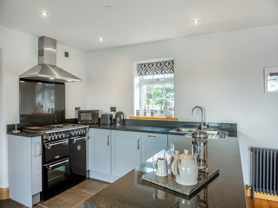 Kitchen area | Deri - Parc Wernol Cottages, Chwilog, near Pwllheli