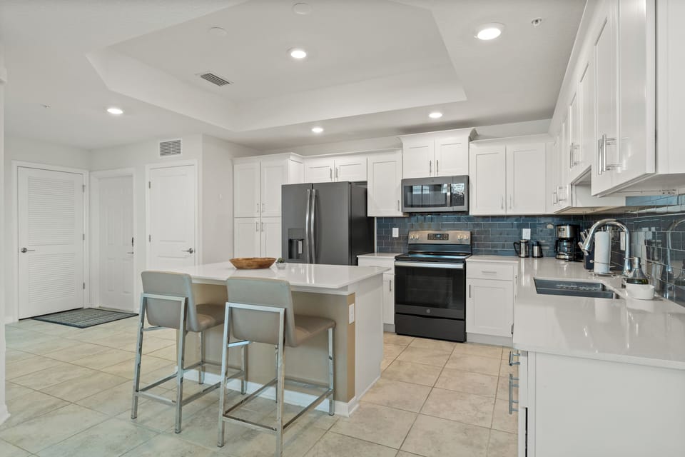 Modern kitchen with full amenities, ideal for cooking and enjoying family meals