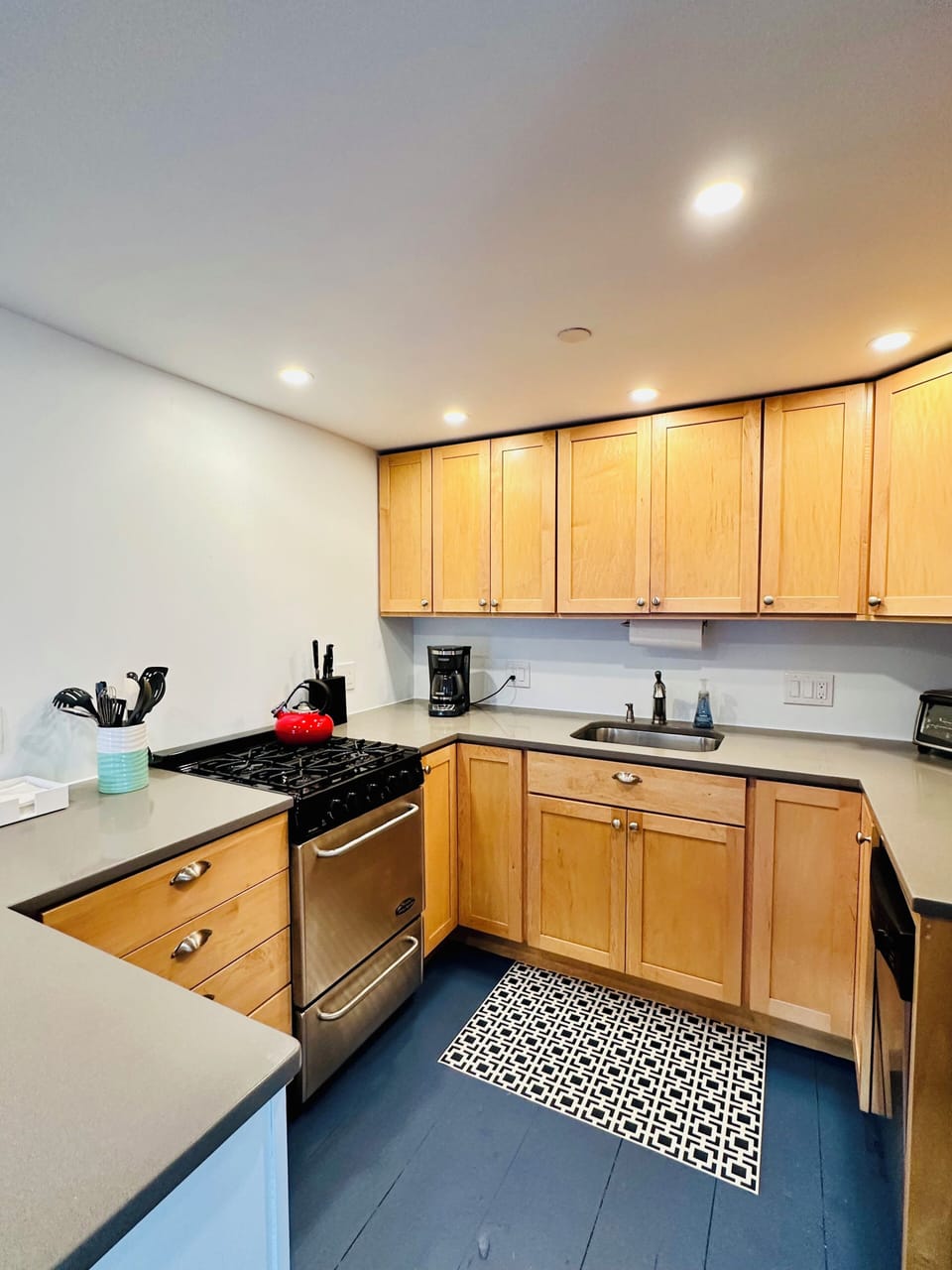 Fully-stocked and roomy kitchen make preparing a meal easy.