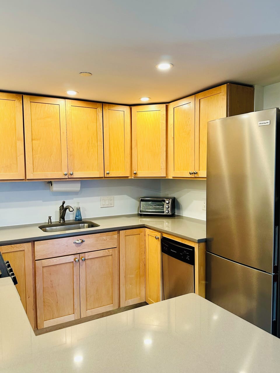 Appliances include, toaster, coffee maker, microwave, and blender for cocktails