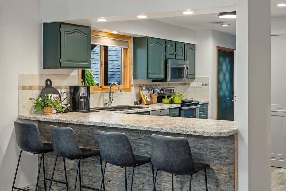 Gather around the kitchen island! Perfect for casual dining or socializing while you cook