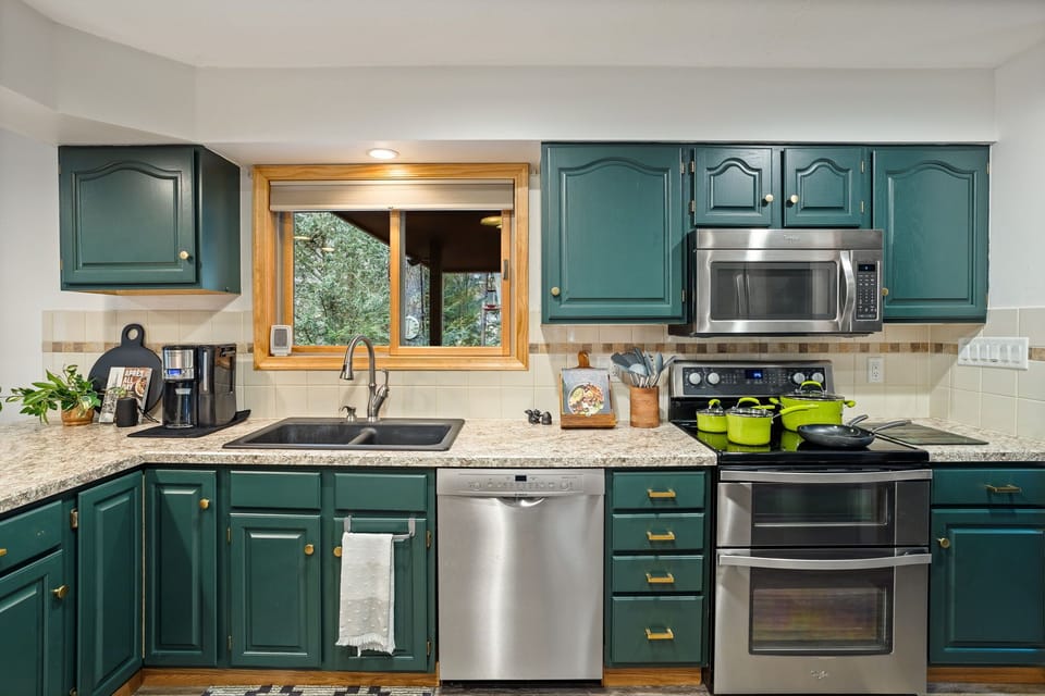 Whip up culinary masterpieces in this stylish, fully equipped kitchen that's designed for creativity and flavor!