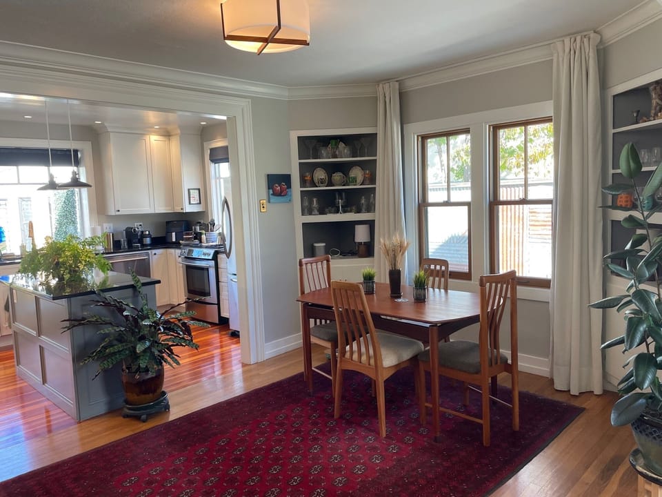 Another view of the dining room and into the kitchen