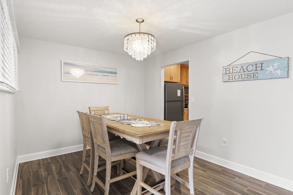 Dining area with a table for four plus bench seating for shared meals