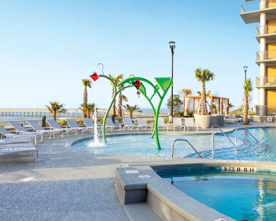 Soak up the sun in the poolside area with comfortable lounge chairs and ocean views.