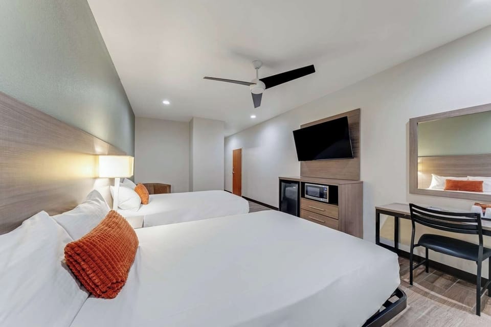 Unit with 2 Double beds. Exact unit will be assigned upon arrival. Views, colors, and decor may vary.