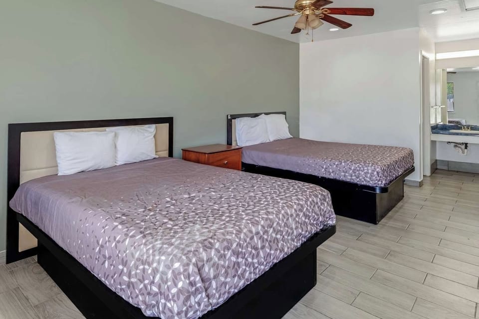 Unit with 2 Double beds. Exact unit will be assigned upon arrival. Views, colors, and decor may vary.