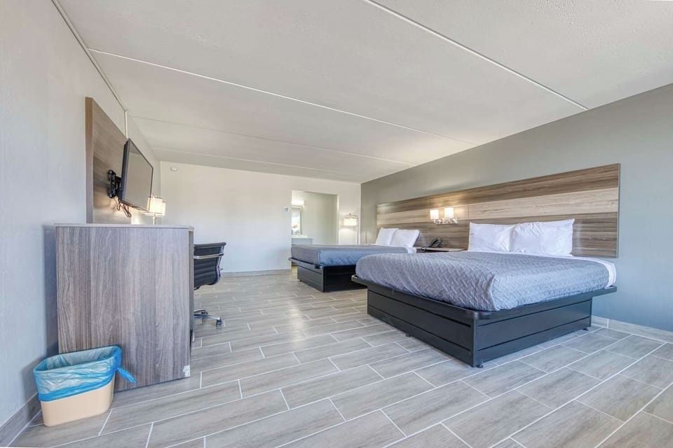 Stretch out in an open layout with two beds and lounge space.