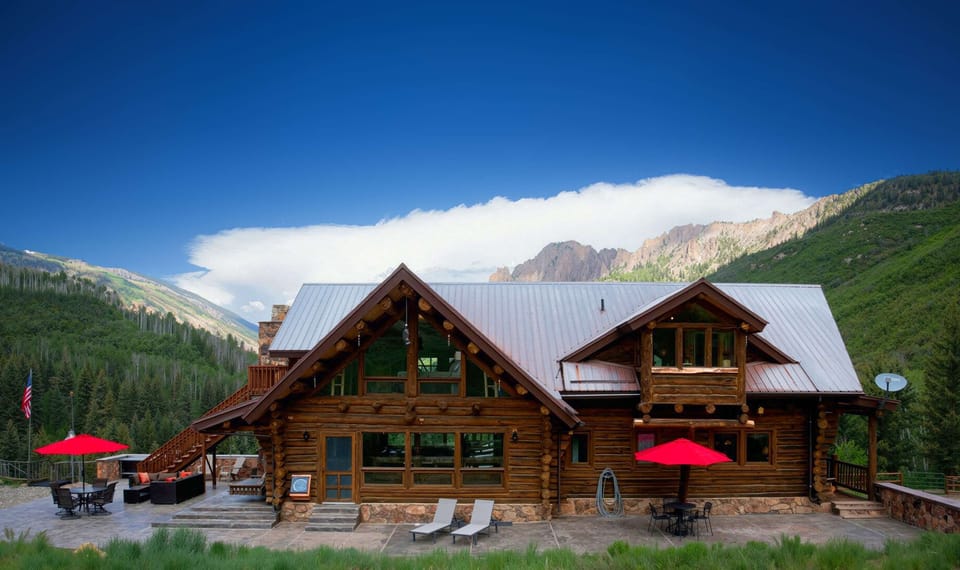 Spacious exterior of the property featuring stunning views and areas to gather.