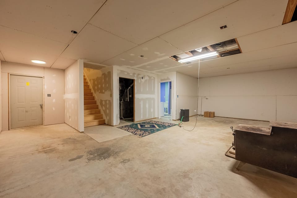 Basement leads to laundry room.